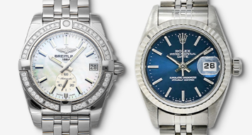 A woman's Breitling watch and a woman's Rolex watch.