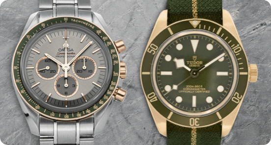 OMEGA and TUDOR watch on a light grey textured background.