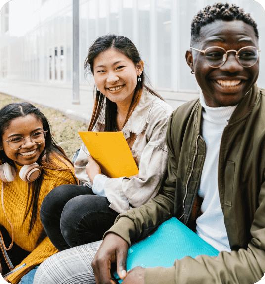 A group of people smiling holding folders linking to back to school event page