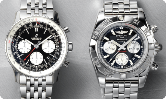 Two silver and black Breitling watches.