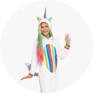 A girl in a white and rainbow unicorn onesie.