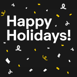 White text reading 'Happy holidays' sits on a black background with silver and gold confetti.