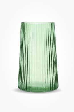 A green glass vase linking to home decor for charity page