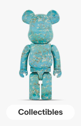 A turquoise patterned plastic bear with movable arms and legs. Image links to Collectibles page.