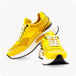 Yellow sneakers with white accents linking to fashion deals page