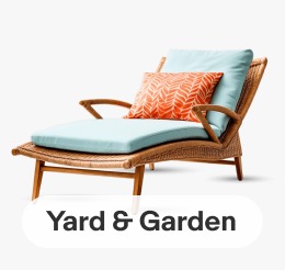 A teak outdoor chaise with blue and orange cushions. Image links to Yard & Garden page.