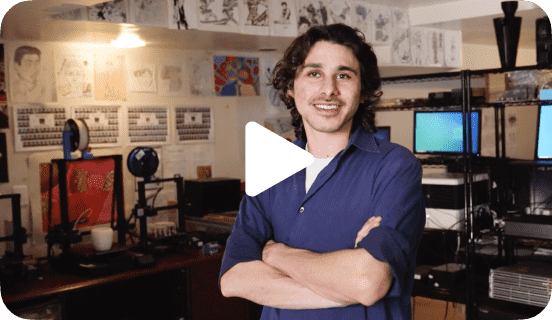 A person smiling at the camera with their arms crossed linking to a seller story