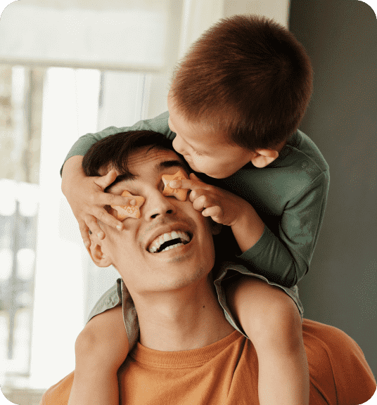 Son on dad's shoulders linking to Father's Day gifts