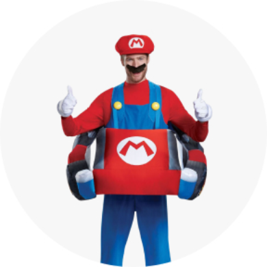 A man in a Mario costume with a Mario Kart car attached.