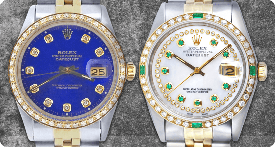 Two Rolex watches on a grey textured background.