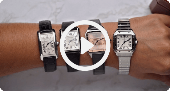 Four titanium watches lined up on a person's wrist.